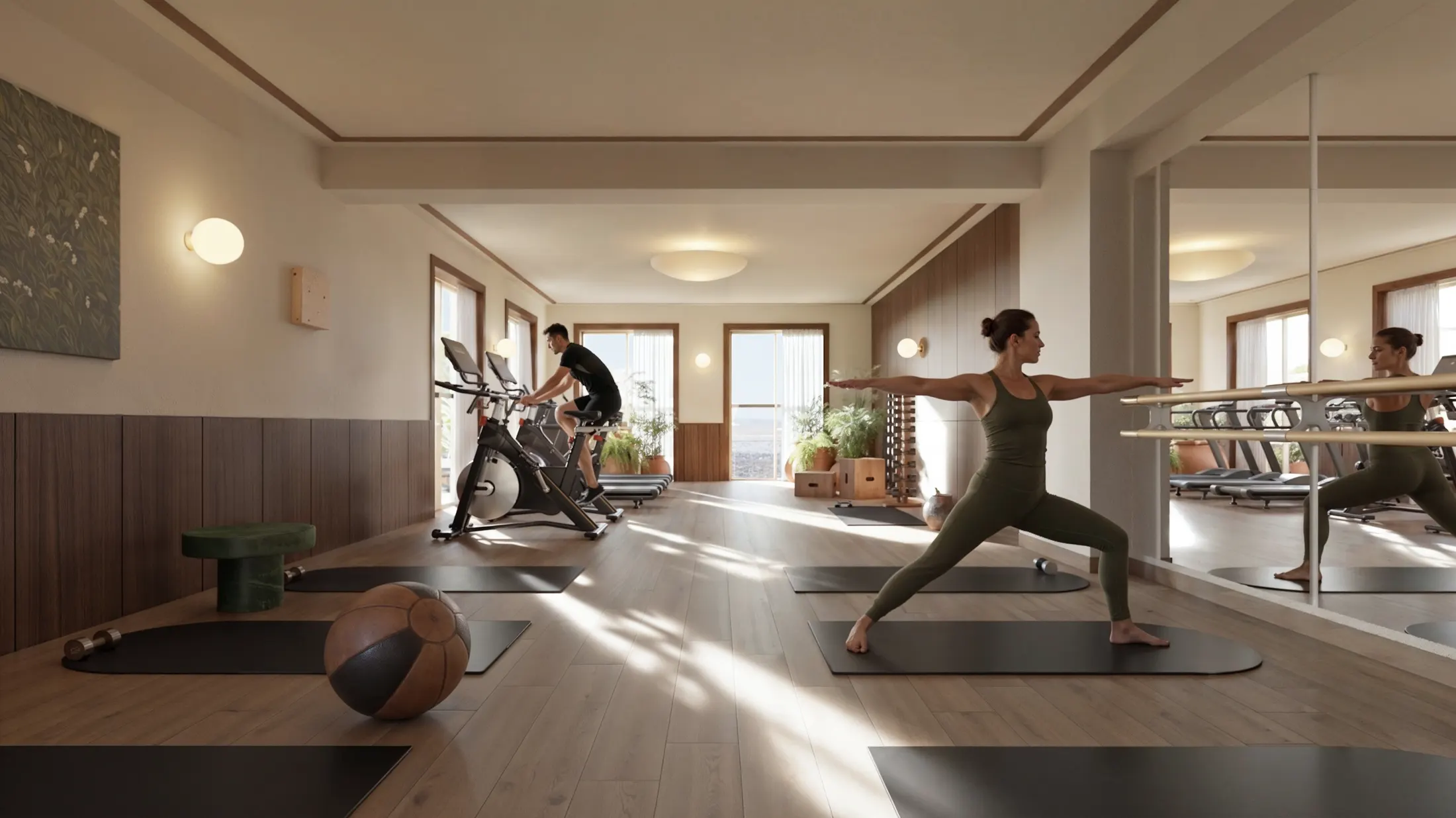 Zona de yoga y peso libre del gimnasio